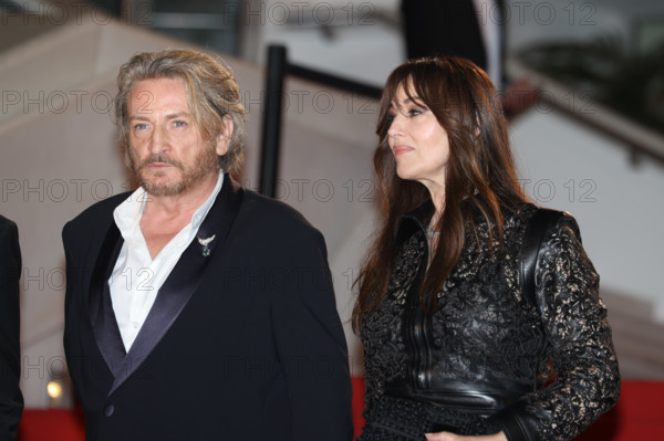 Benoit Magimel and Monica Bellucci (in Fendi) attends the "Histoires De La Nuit" (The Birthday Party) screening during the 79th annual Cannes Film Festival at Palais des Festivals on May 22, 2026 in Cannes, France.