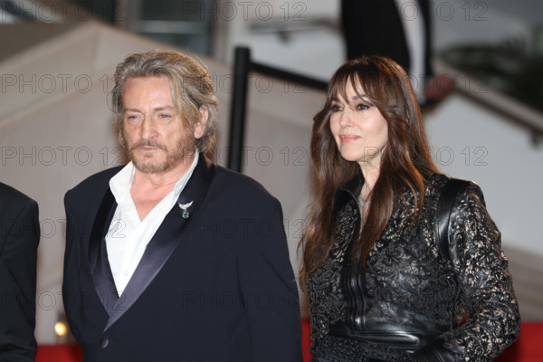 Benoit Magimel and Monica Bellucci (in Fendi) attends the "Histoires De La Nuit" (The Birthday Party) screening during the 79th annual Cannes Film Festival at Palais des Festivals on May 22, 2026 in Cannes, France.