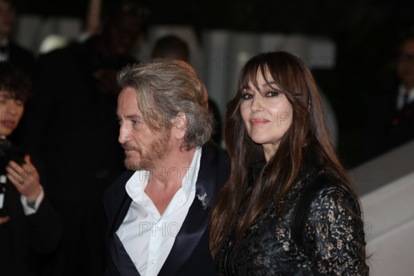 Benoit Magimel and Monica Bellucci (in Fendi) attends the "Histoires De La Nuit" (The Birthday Party) screening during the 79th annual Cannes Film Festival at Palais des Festivals on May 22, 2026 in Cannes, France.