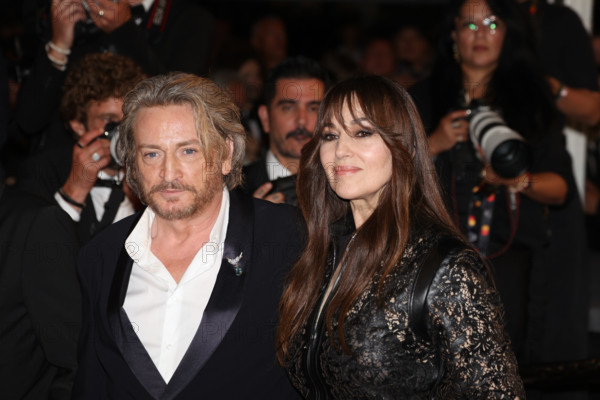 Benoit Magimel and Monica Bellucci (in Fendi) attends the "Histoires De La Nuit" (The Birthday Party) screening during the 79th annual Cannes Film Festival at Palais des Festivals on May 22, 2026 in Cannes, France.