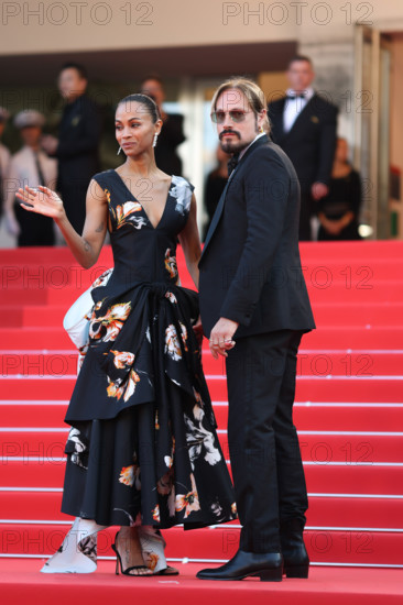 Zoe Saldaña (in Chanel) and Marco Perego attend the closing ceremony of the 79th annual Cannes Film Festival at Palais des Festivals on May 23, 2026 in Cannes, France