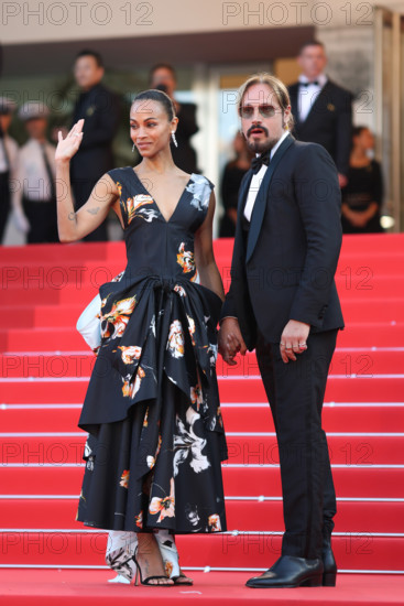 Zoe Saldaña (in Chanel) and Marco Perego attend the closing ceremony of the 79th annual Cannes Film Festival at Palais des Festivals on May 23, 2026 in Cannes, France