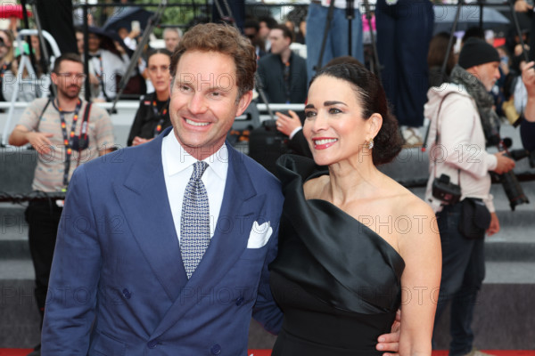 Marco Colombo and Randi Ingerman attend the "L'Inconnue" (The Unknown) screening during the 79th annual Cannes Film Festival at Palais des Festivals on May 18, 2026 in Cannes, France.