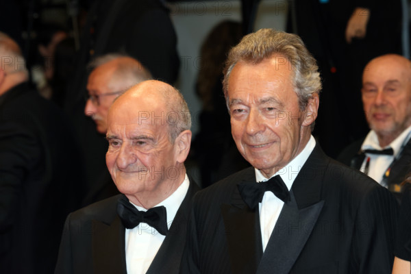 Michel Denisot and Pierre Lescure attend the "Coward" screening during the 79th annual Cannes Film Festival at Palais des Festivals on May 21, 2026 in Cannes, France.
