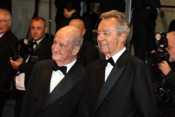 Michel Denisot and Pierre Lescure attend the "Coward" screening during the 79th annual Cannes Film Festival at Palais des Festivals on May 21, 2026 in Cannes, France.