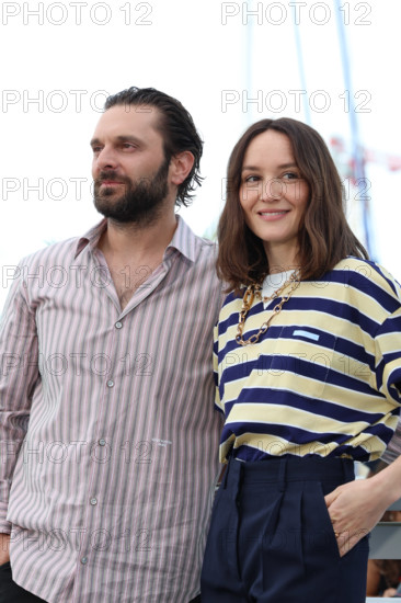 Pio Marmaï and Anaïs Demoustier (in Prada) pose during "La Vénus Electrique" (The Electric Kiss) photocall at the 79th annual Cannes Film Festival at Palais des Festivals on May 13, 2026 in Cannes, France.