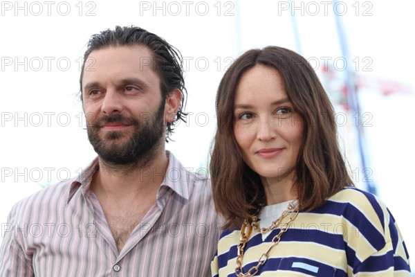 Pio Marmaï and Anaïs Demoustier (in Prada) pose during "La Vénus Electrique" (The Electric Kiss) photocall at the 79th annual Cannes Film Festival at Palais des Festivals on May 13, 2026 in Cannes, France.