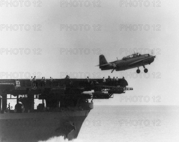 Catapult launch of a torpedo plane by an American aircraft carrier, 1944-45