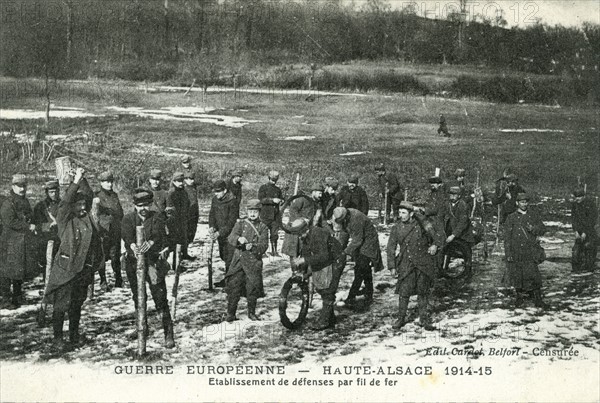 French soldiers installing barbed wire