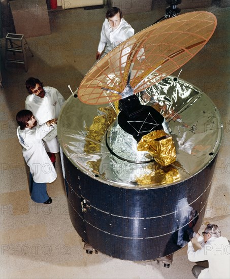Inspecting a satellite type 'Anik A', 1972