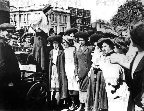 British worker addressing her workmates