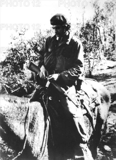 During the revolution, Che Guevara riding in the Sierra (1956-1959)