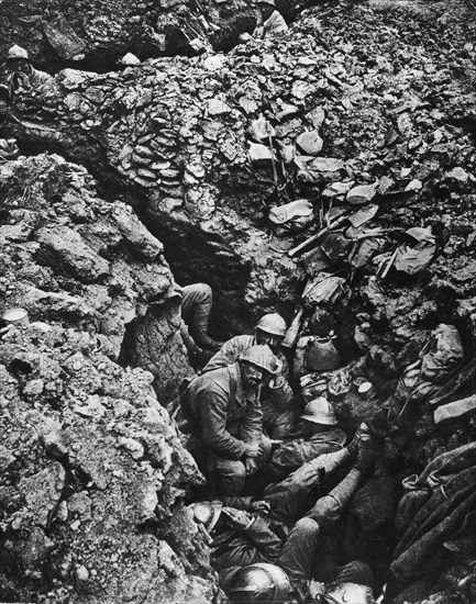 Soldiers in a trench waiting for a counter-attack, August 1917