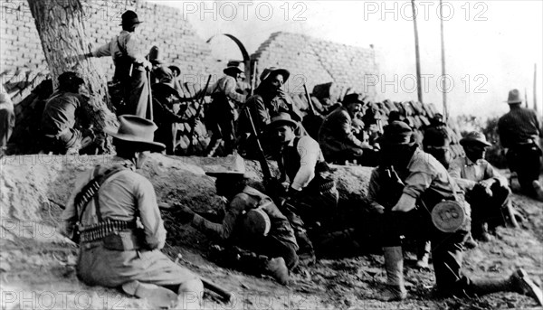 Mexican revolution. An American combatant among the ranks of Mexican insurgents in Juarez