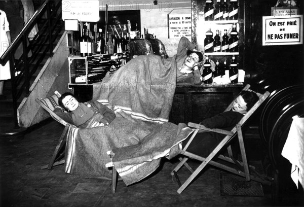 Strikers of a French department store preparing for the night, 1936