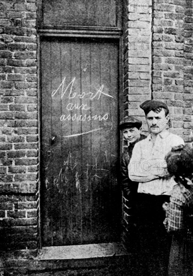 Strike at Villeneuve-Saint-Georges. Graffitti on the door of a miner who killed a striker