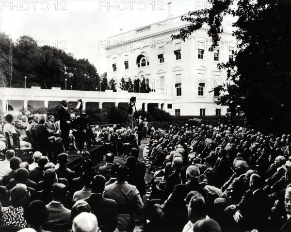 President Herbert Hoover delivering as speech about unemployment at Washington