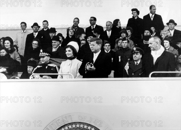 Washington, inaugural parade. In the stand, Kennedy and his wife, and on the r., vice-president Johnson