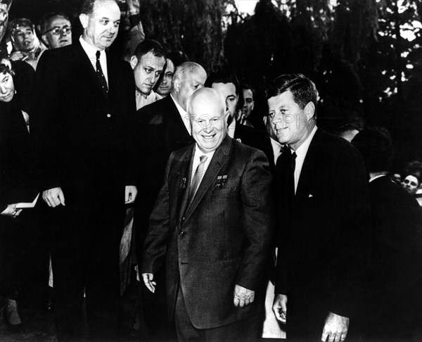 Vienna. Kennedy and Khrushchev heading to the American ambassy. In the background, on the left, Secretary of State Dean Rusk