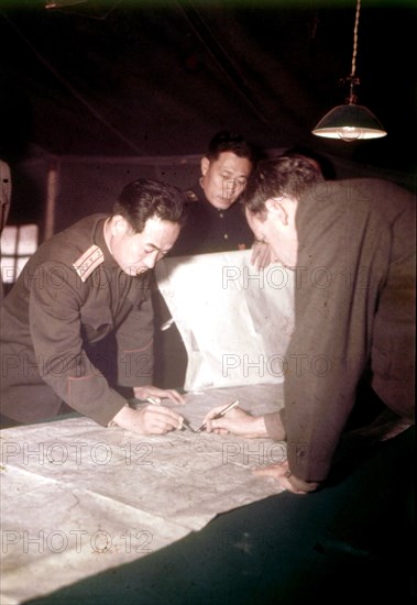 Panmunjom armistice setting the partition line between South and North Korea. On the picture, Colonel Chang Chun San, communist liaison officer and James C. Murray (United Nations)