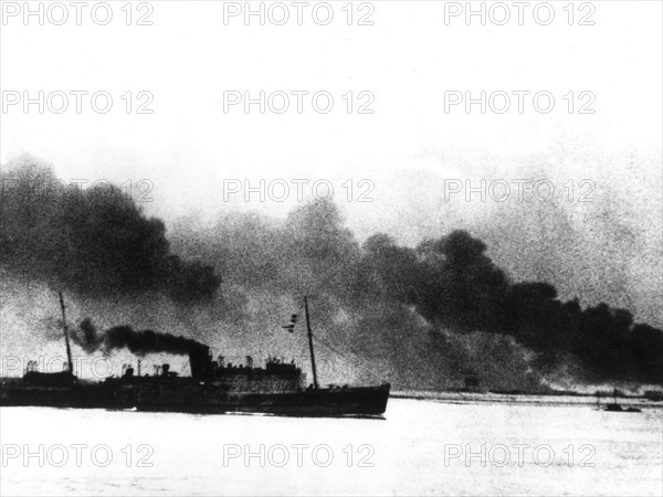 British boats on fire off Dunkirk (1940)