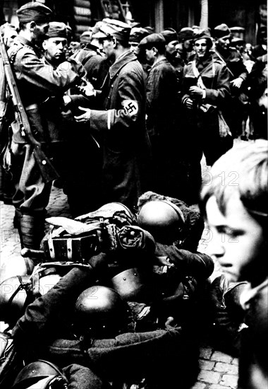 In a village of the Sudetes, Czech troops are waiting for the relief German troops