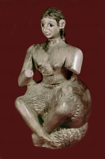 Statue of the singer Ur-Nanshe. Fragment from Ishtar Mari Temple