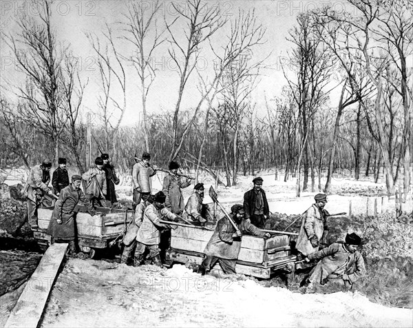 Construction of the Transiberian. Criminals working on the railway, supervised by soldiers