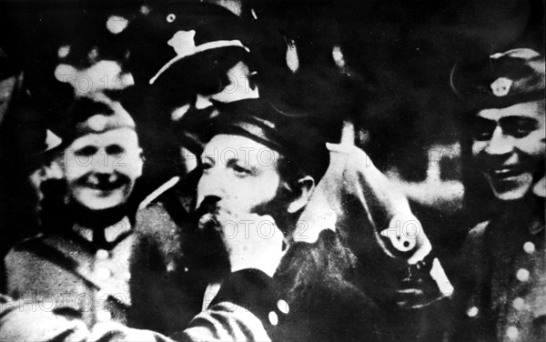 Warsaw ghetto. Germans cutting off the beards of Jews