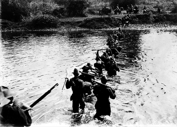 American troops crossing over a river, Philippines