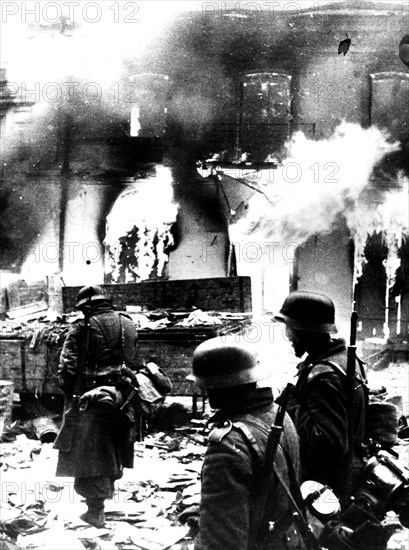 German soldiers watching a city on fire