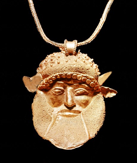 Golden Etruscan pendant representing Achelous