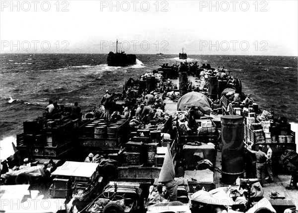 The Normandy landings: 'Marines' with their equipment on a ship deck