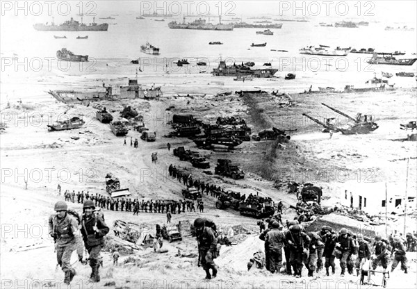 Soldiers landing on a beach in the North of France, 1944