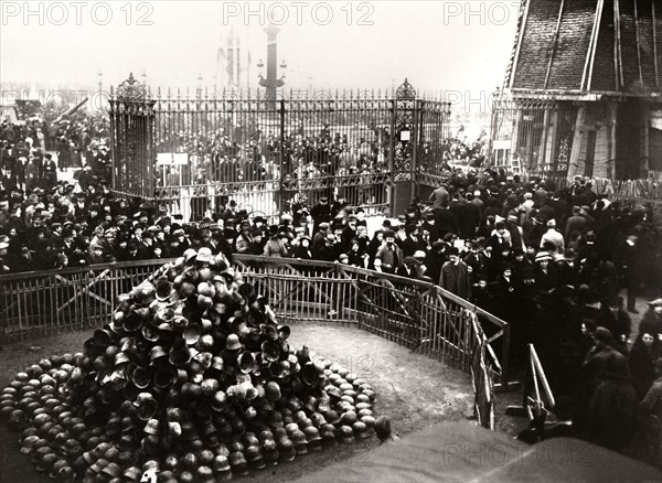 Pile of German helmets on the Concorde square, 1918