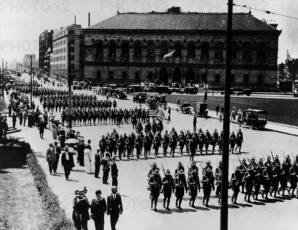 The 1st Heavy artillery volunteers' regiment walking towards the Boston harbour, 1917