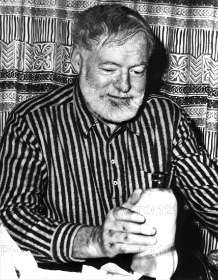 One of the last pictures of Ernest Hemingway (1899-1961) during a party at Sun Valley