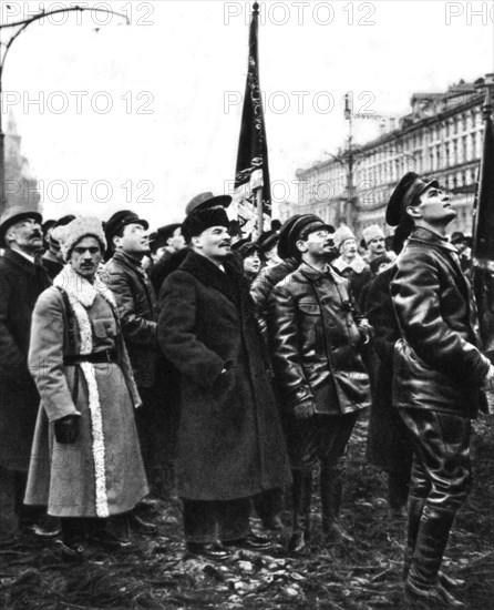 Moscow. Lenin and Sverdlov in front of the provisory memorial to Karl Marx and Friedrich Engels, which has just been unveiled