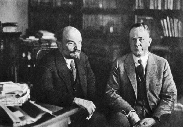 Moscow. Lenin talking with American economist Christensen, in his office
