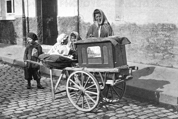 Woman playing the barrel organ