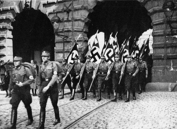 Nazi troops marching through the gate in Danzig