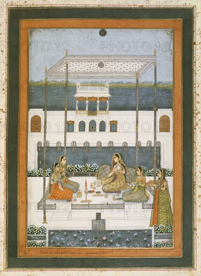 Evening party in the garden of a Mughal Palace