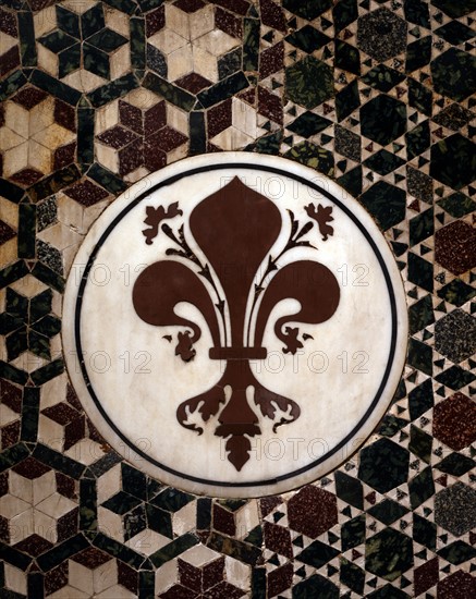 Tondo bearing a fleur de lys, symbol of the town of Florence