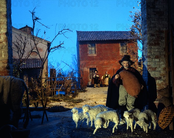 Nativity scene: Shepherd with flock of sheep