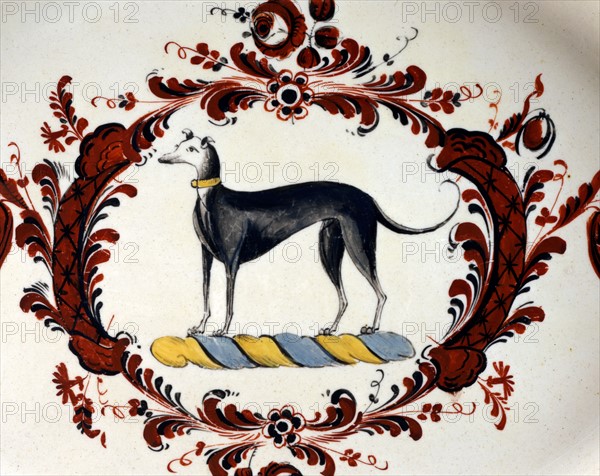 Detail of a platter depicting a dog (Greyhound)