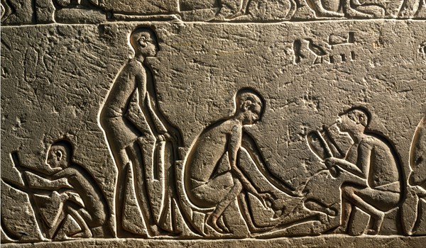 Arts and crafts relief from Saqqarah depicting fur manufacture and shoe making