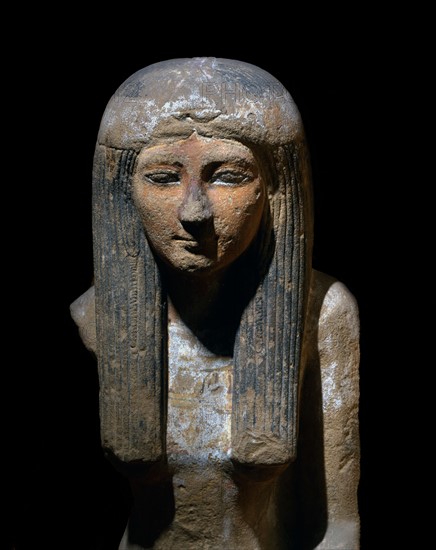 Bust of female statue made of painted sandstone