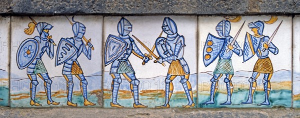 Majolica, soldiers in armor with swords and shields.