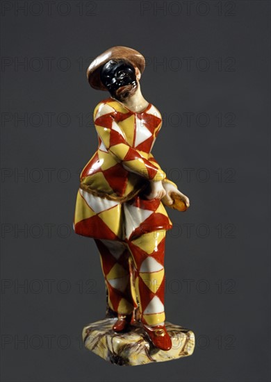 Harlequin, painted porcelain figurine