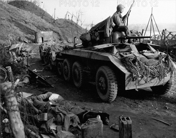 An U.S armored reconnaissance car near the Remagen Bridge, Germany (March 1945)